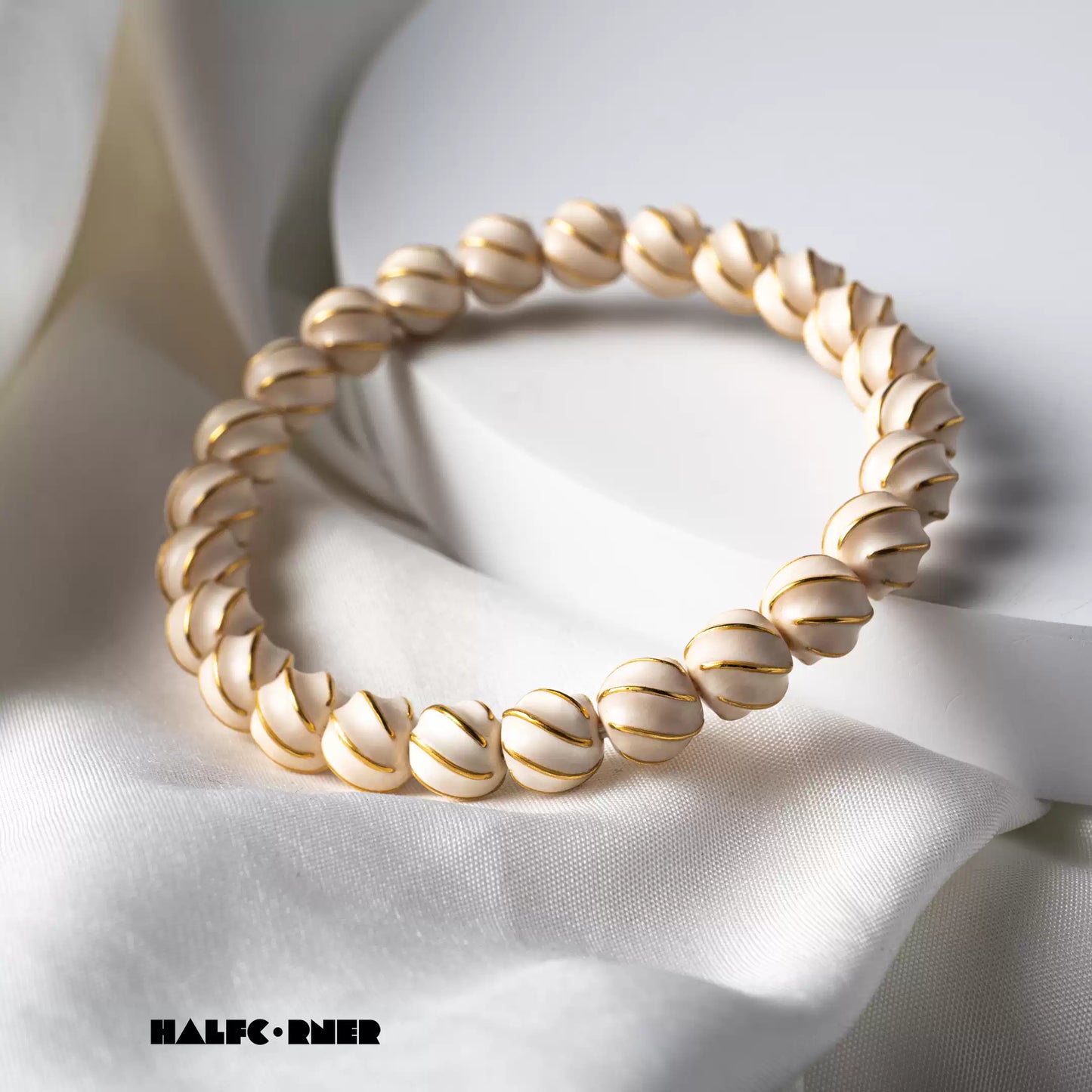 Fossil Mammoth Ivory Gold‑Inlaid Swirl Bracelet