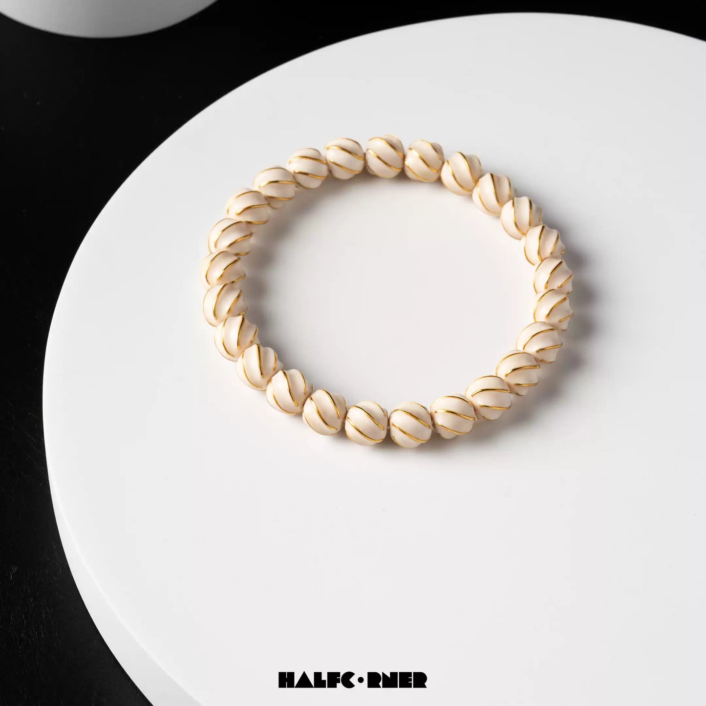 Fossil Mammoth Ivory Gold‑Inlaid Swirl Bracelet