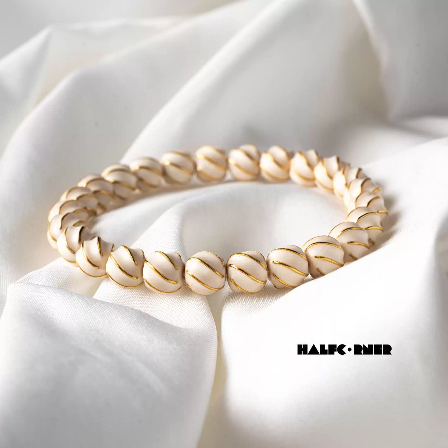 Fossil Mammoth Ivory Gold‑Inlaid Swirl Bracelet