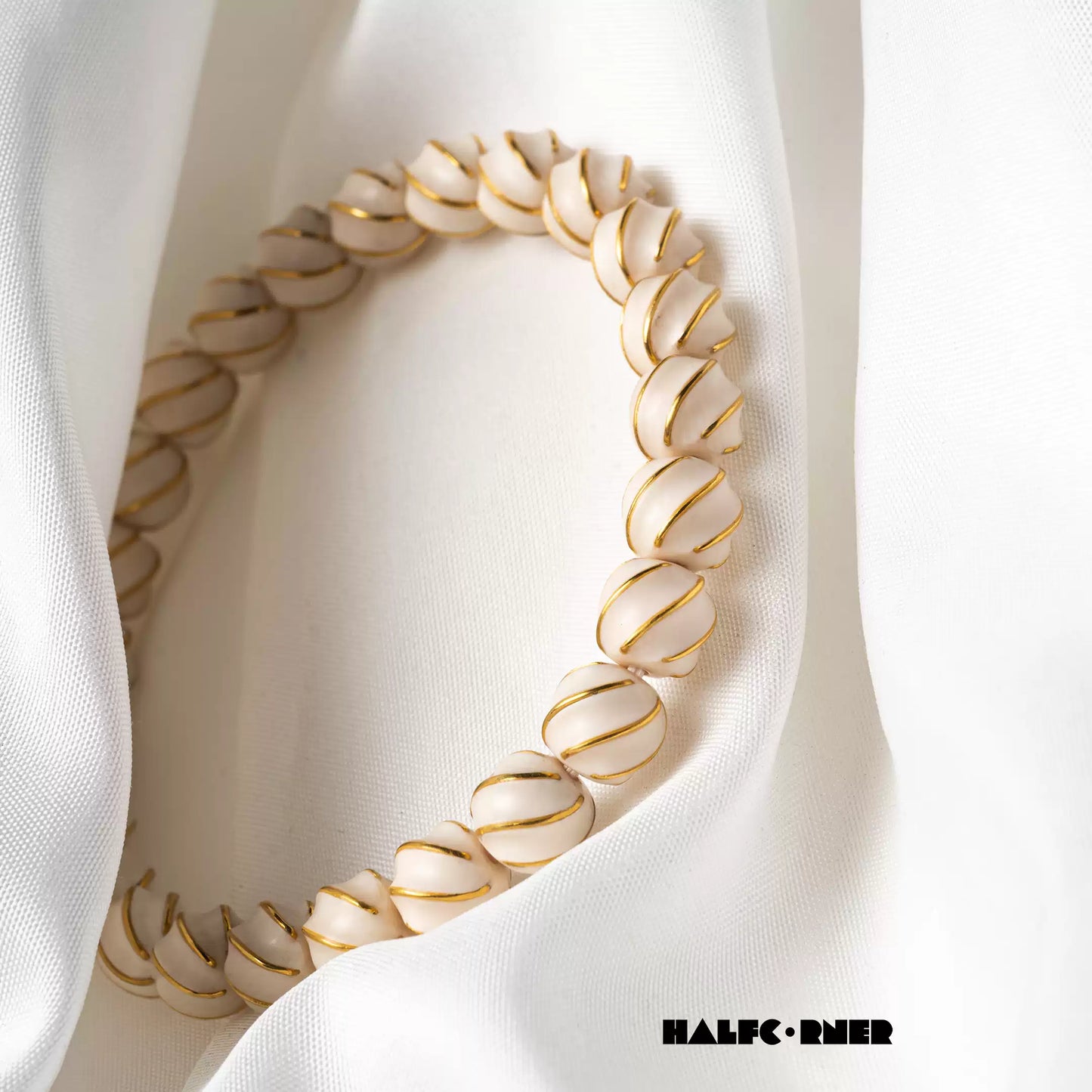 Fossil Mammoth Ivory Gold‑Inlaid Swirl Bracelet