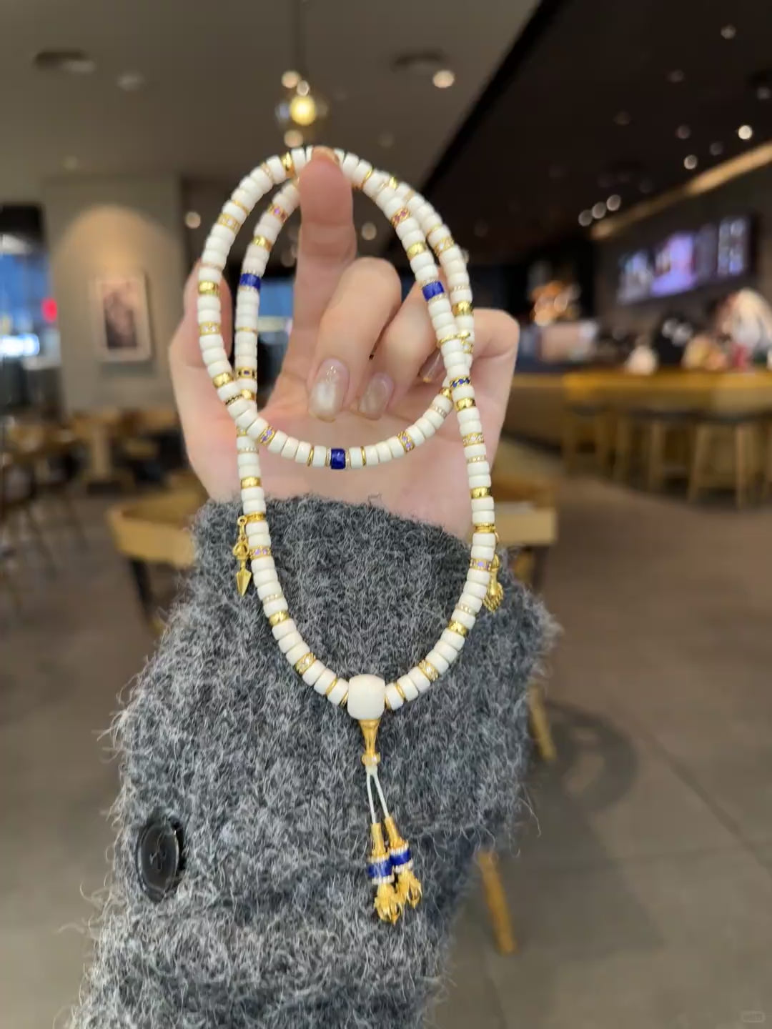 Load and play video in Gallery viewer, Fossil Mammoth Ivory 108-Bead Mala with Gold &amp;amp; Lapis Accents
